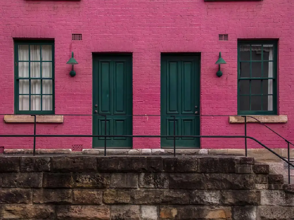 Articles | Diversité Diversity A Catalyst Articles green-door-with-pink-wall